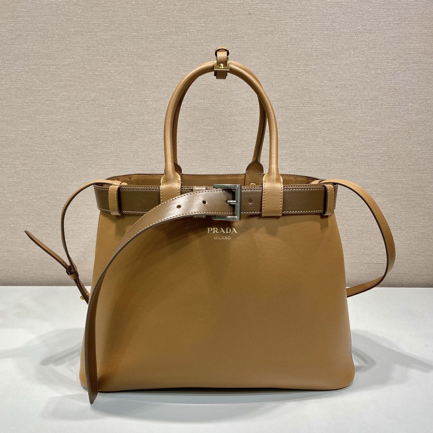 Pra*a top handle bags